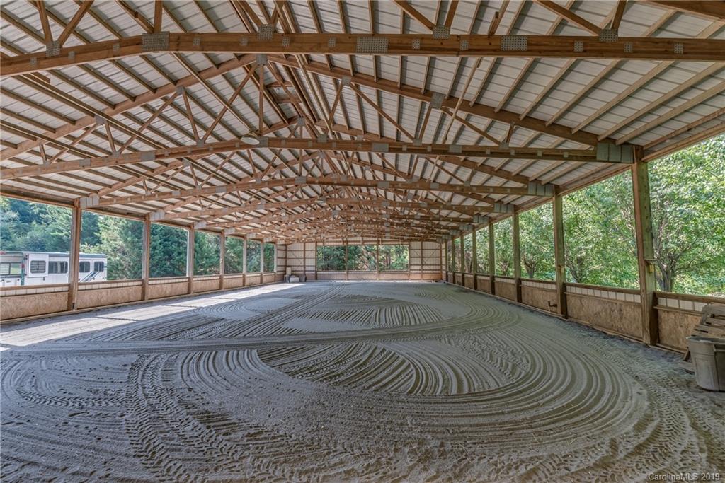 1790 Red Fox Road Tryon, NC 28782 - Photo 24 of 40 a view of empty room with wooden floor and fence