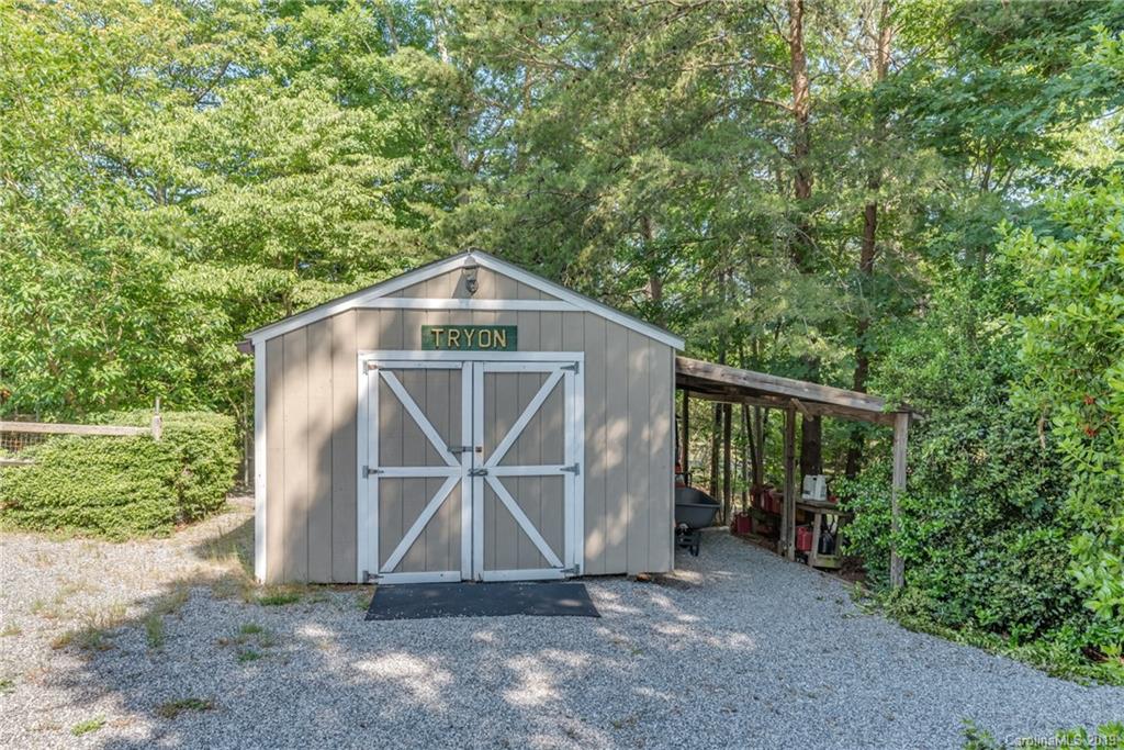 1790 Red Fox Road Tryon, NC 28782 - Photo 28 of 40 a house with trees in the background