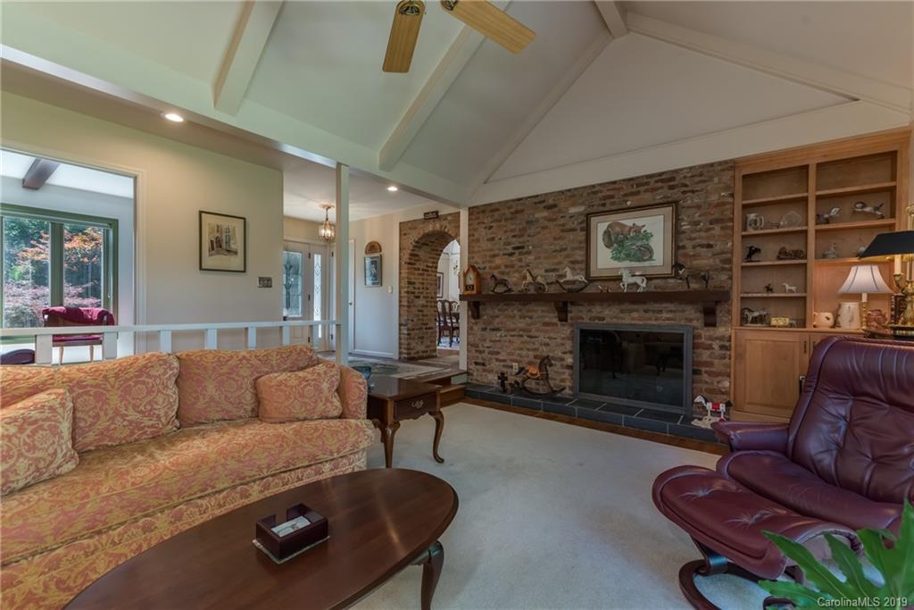 1790 Red Fox Road Tryon, NC 28782 - Photo 4 of 40 a living room with furniture and a fireplace