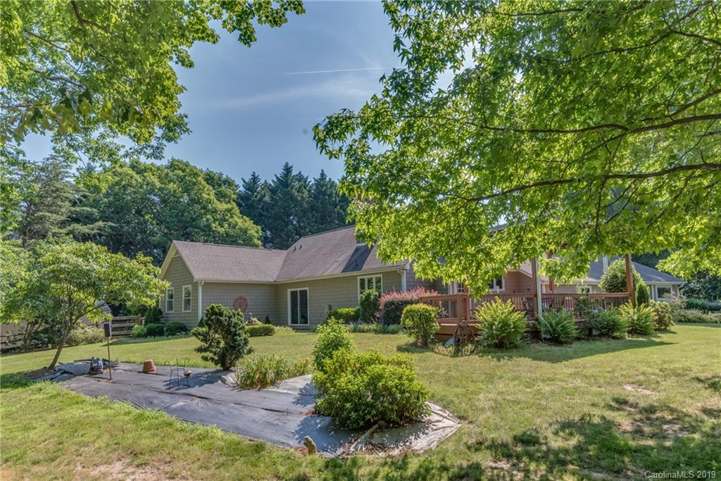 1790 Red Fox Road Tryon, NC 28782 - Photo 32 of 40 a front view of a house with a yard
