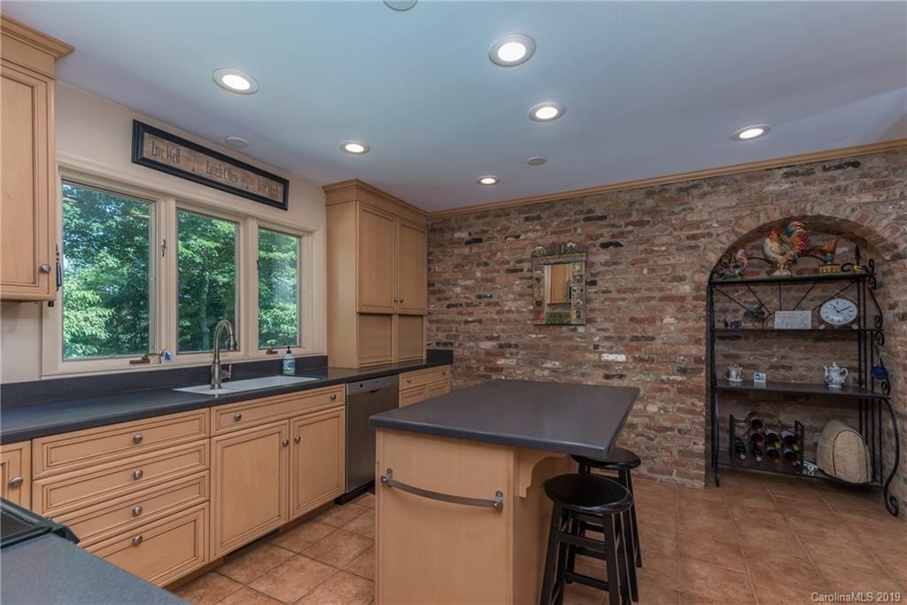 1790 Red Fox Road Tryon, NC 28782 - Photo 7 of 40 a kitchen with sink and window