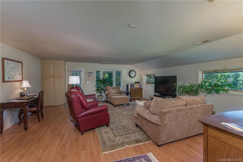 1790 Red Fox Road Tryon, NC 28782 - Photo 10 of 40 a living room with furniture and a flat screen tv