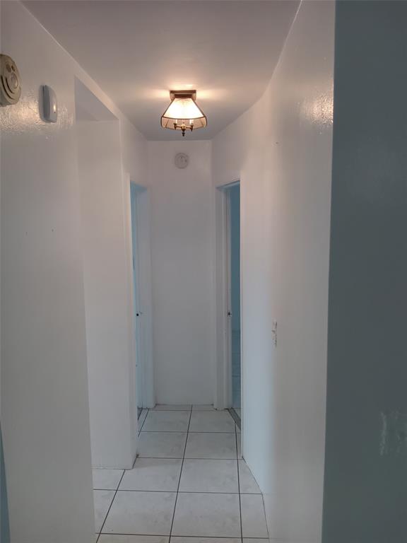 120 Northeast 26th Court Pompano Beach, FL 33064 - Photo 18 of 33 a view of an empty room with a mirror