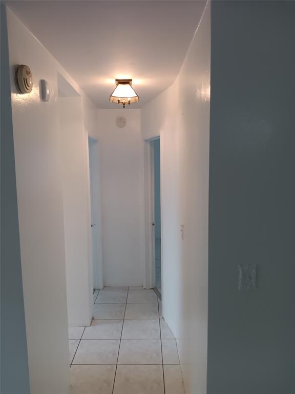 120 Northeast 26th Court Pompano Beach, FL 33064 - Photo 19 of 33 a view of bathroom with a mirror