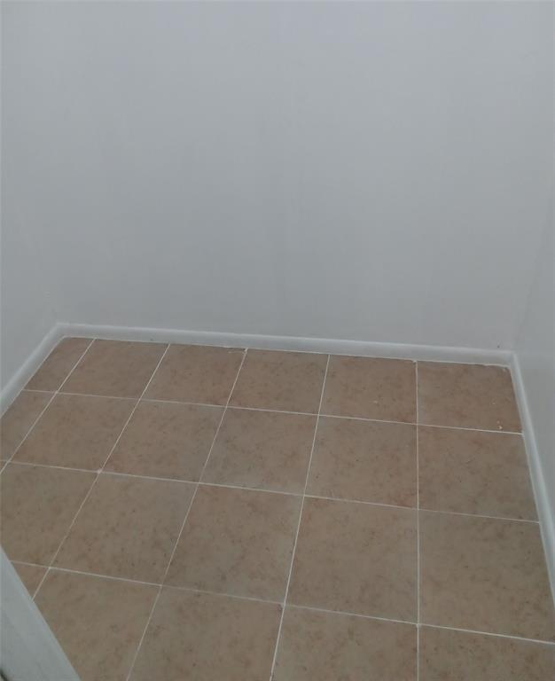 120 Northeast 26th Court Pompano Beach, FL 33064 - Photo 30 of 33 a bathroom with a toilet