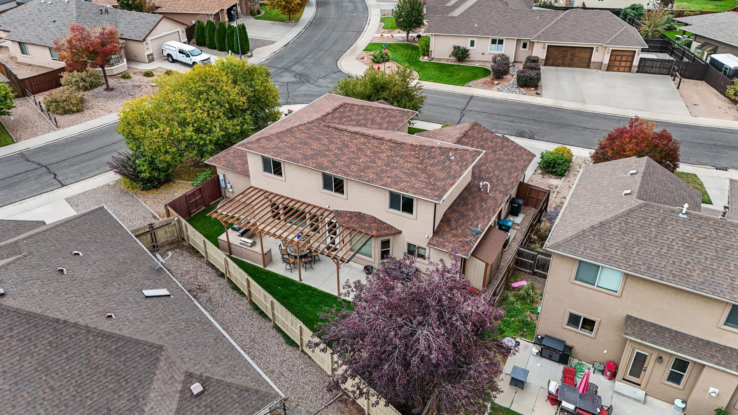791 Yew Street Fruita, CO 81521 - Photo 33 of 33 an aerial view of multiple houses with a yard