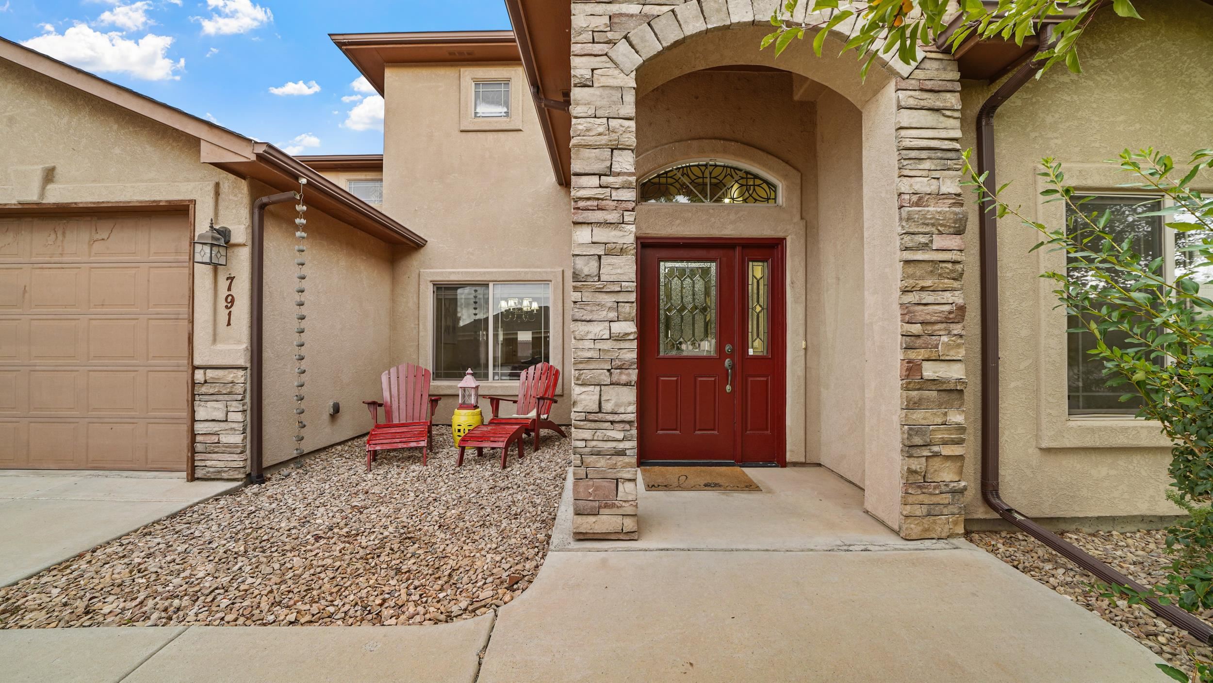 791 Yew Street Fruita, CO 81521 - Photo 4 of 33 a view of building with glass windows and door
