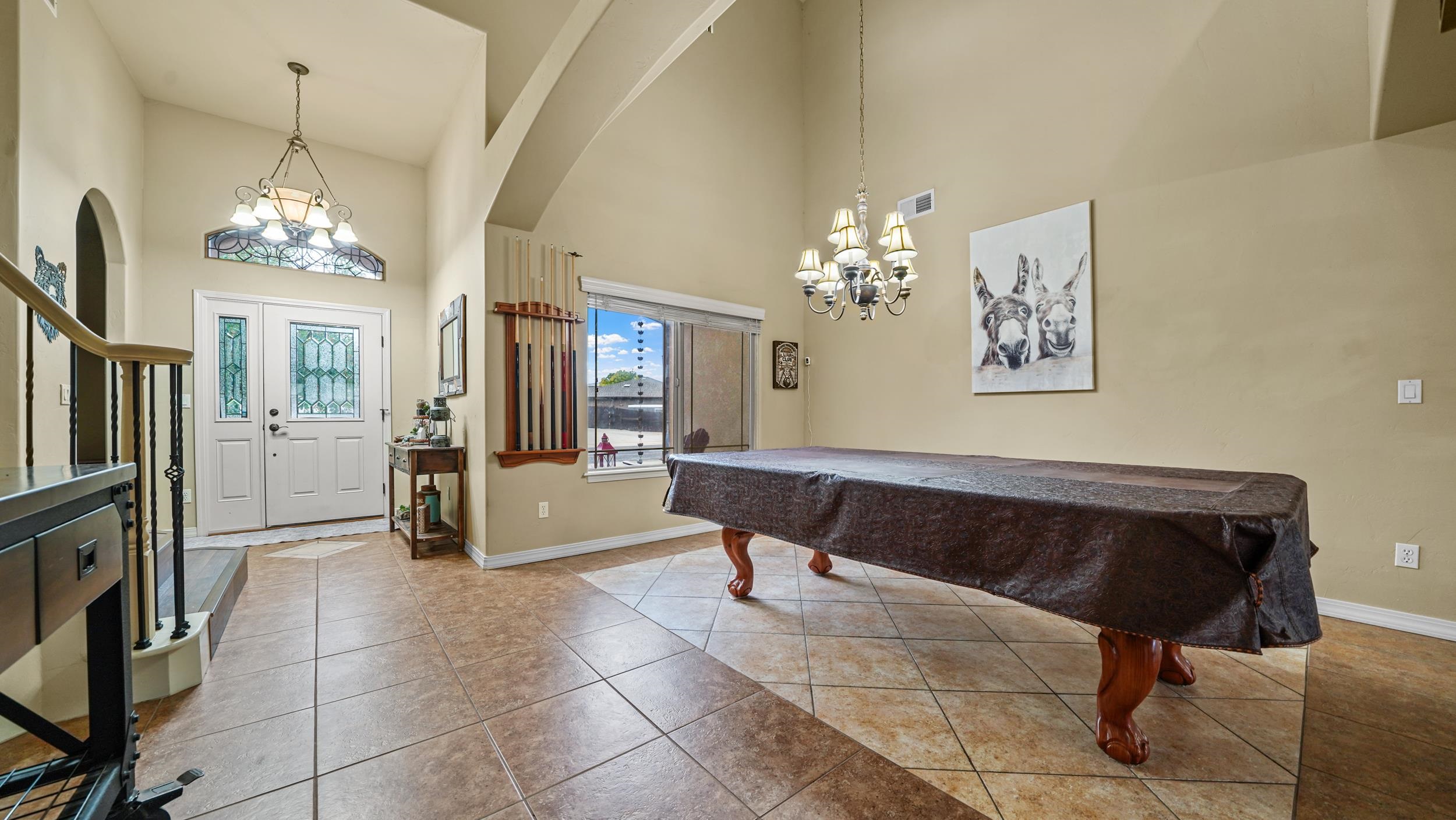 791 Yew Street Fruita, CO 81521 - Photo 5 of 33 a living room with couches a table and kitchen view with wooden floor