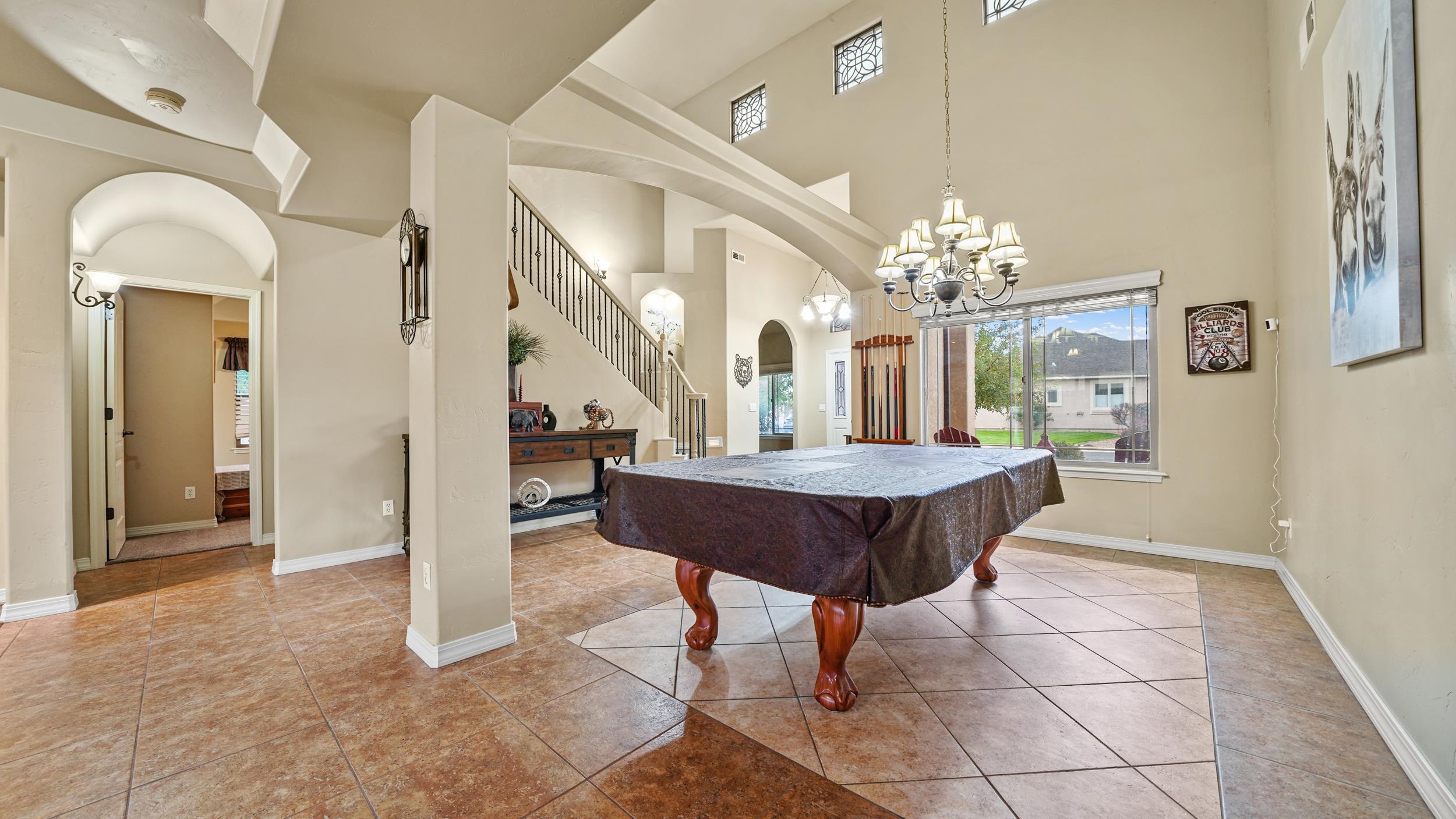 791 Yew Street Fruita, CO 81521 - Photo 7 of 33 a view of a dining room with furniture and a chandelier