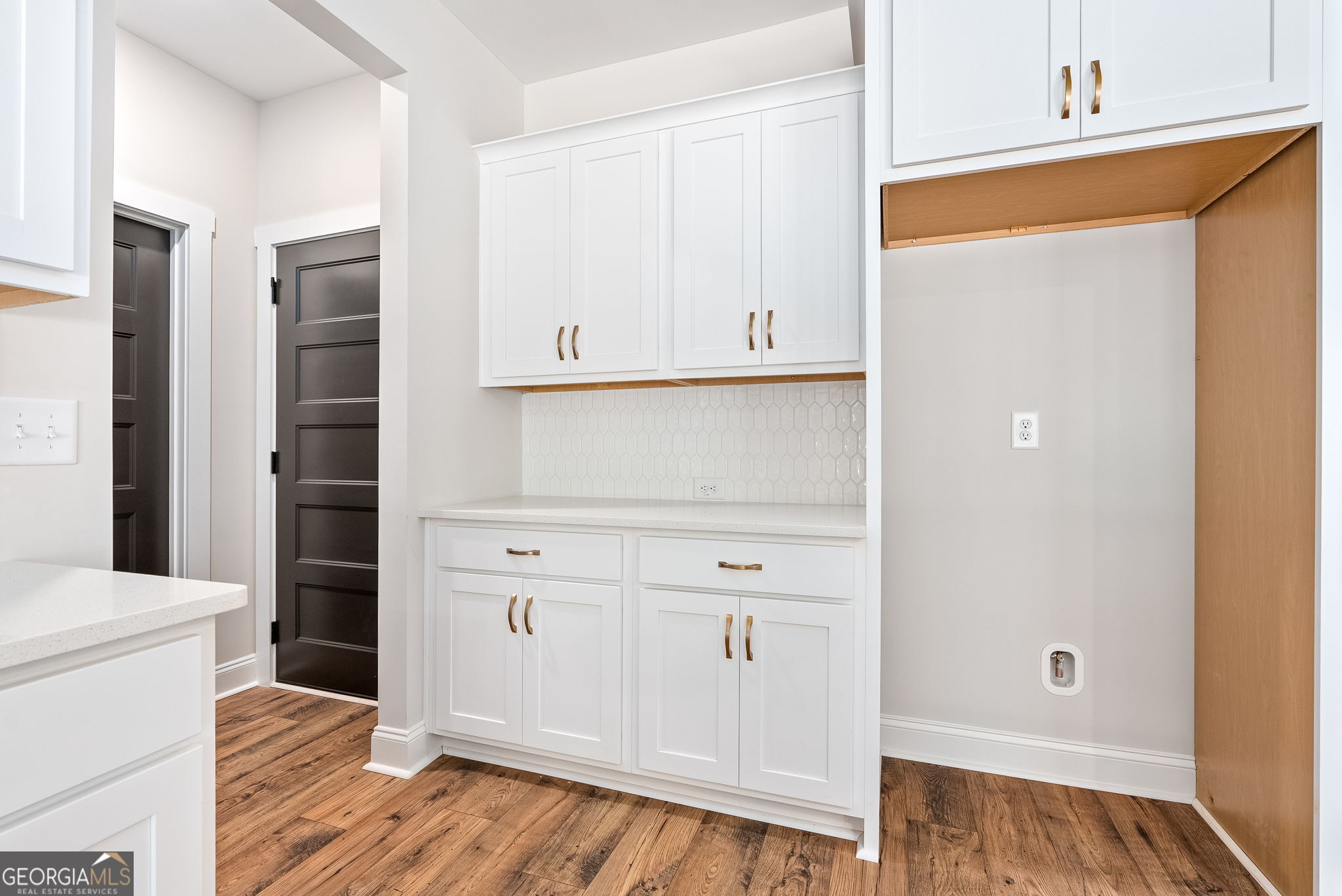 5021 Hammett Road Hogansville, GA 30230 - Photo 11 of 33 a view of walk in closet with empty racks