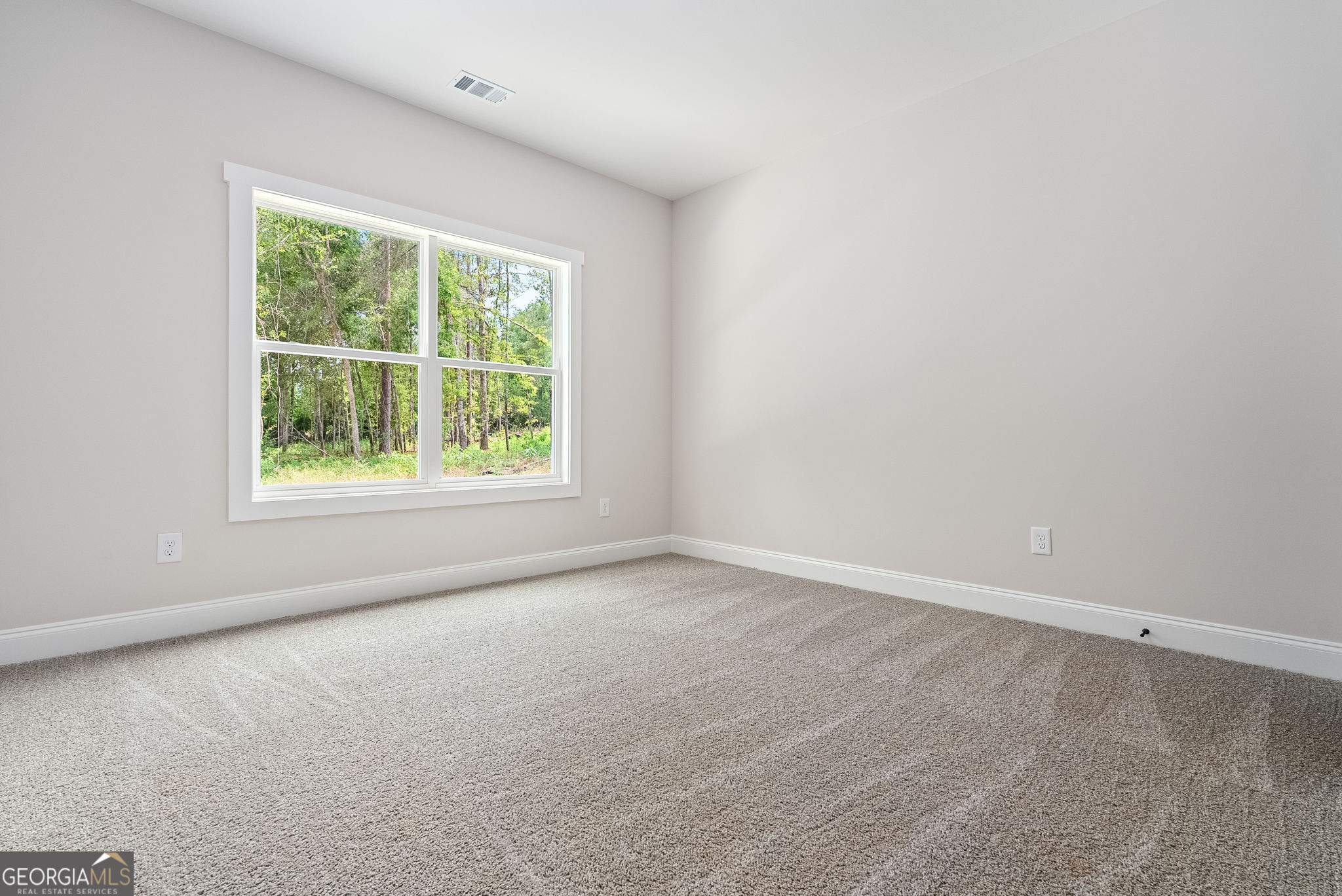 5021 Hammett Road Hogansville, GA 30230 - Photo 15 of 33 an empty room with a window
