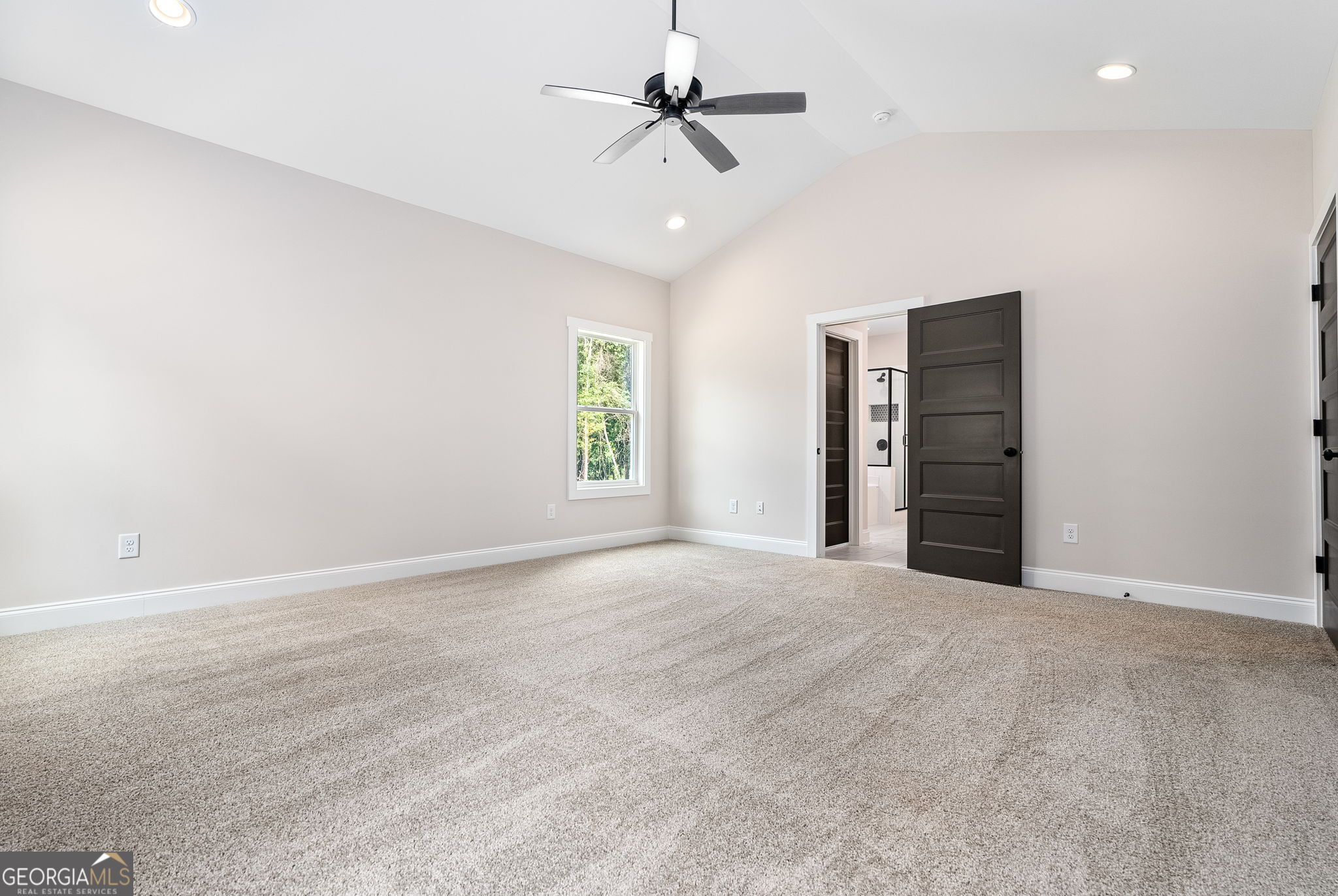 5021 Hammett Road Hogansville, GA 30230 - Photo 19 of 33 an empty room with closet and a ceiling fan