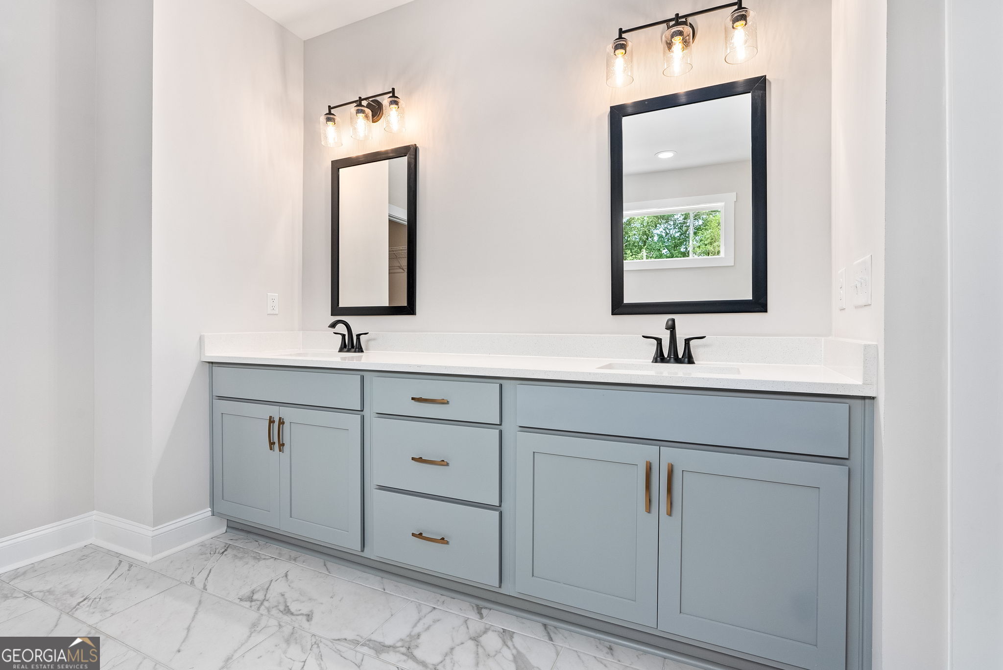 5021 Hammett Road Hogansville, GA 30230 - Photo 20 of 33 a bathroom with a sink and a mirror