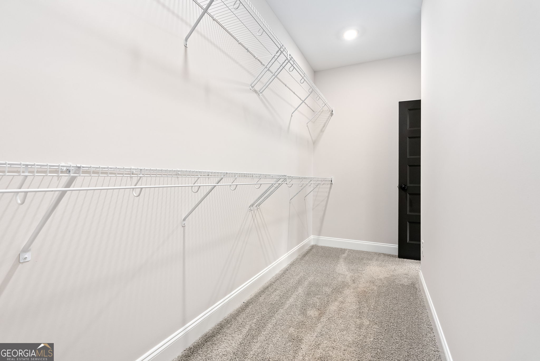 5021 Hammett Road Hogansville, GA 30230 - Photo 24 of 33 a view of a room with racks on the wall