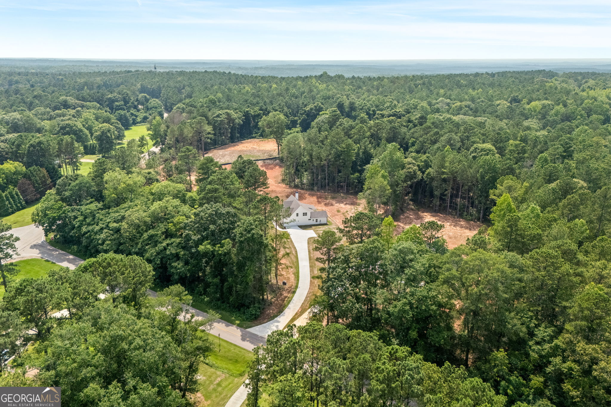 5021 Hammett Road Hogansville, GA 30230 - Photo 4 of 33 an aerial view of residential houses with outdoor space and trees