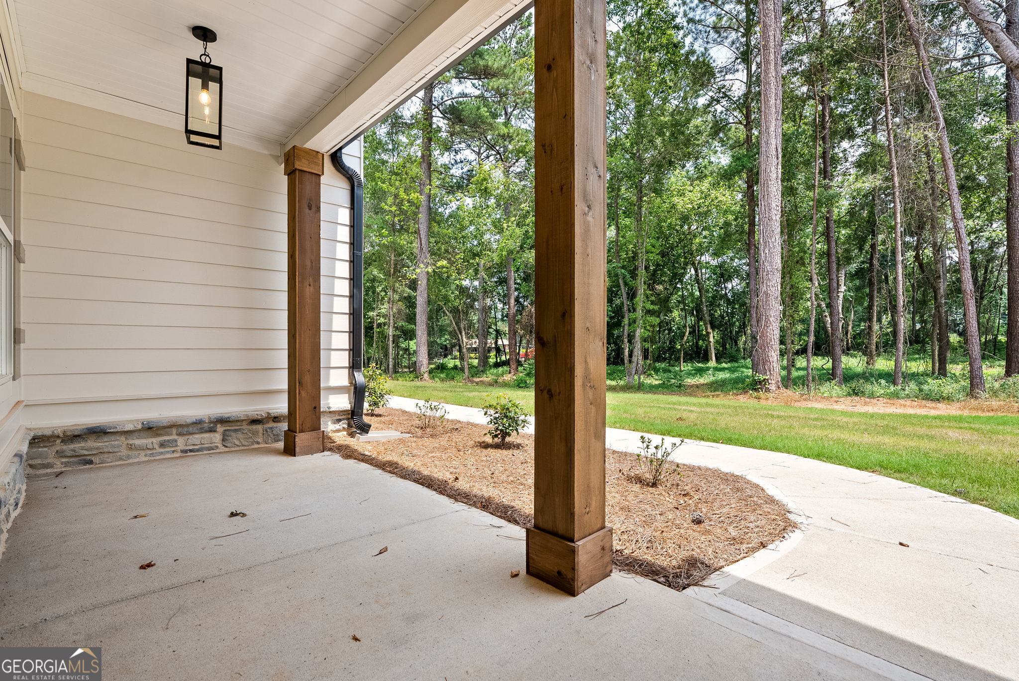 5021 Hammett Road Hogansville, GA 30230 - Photo 5 of 33 a view of a house with backyard and porch