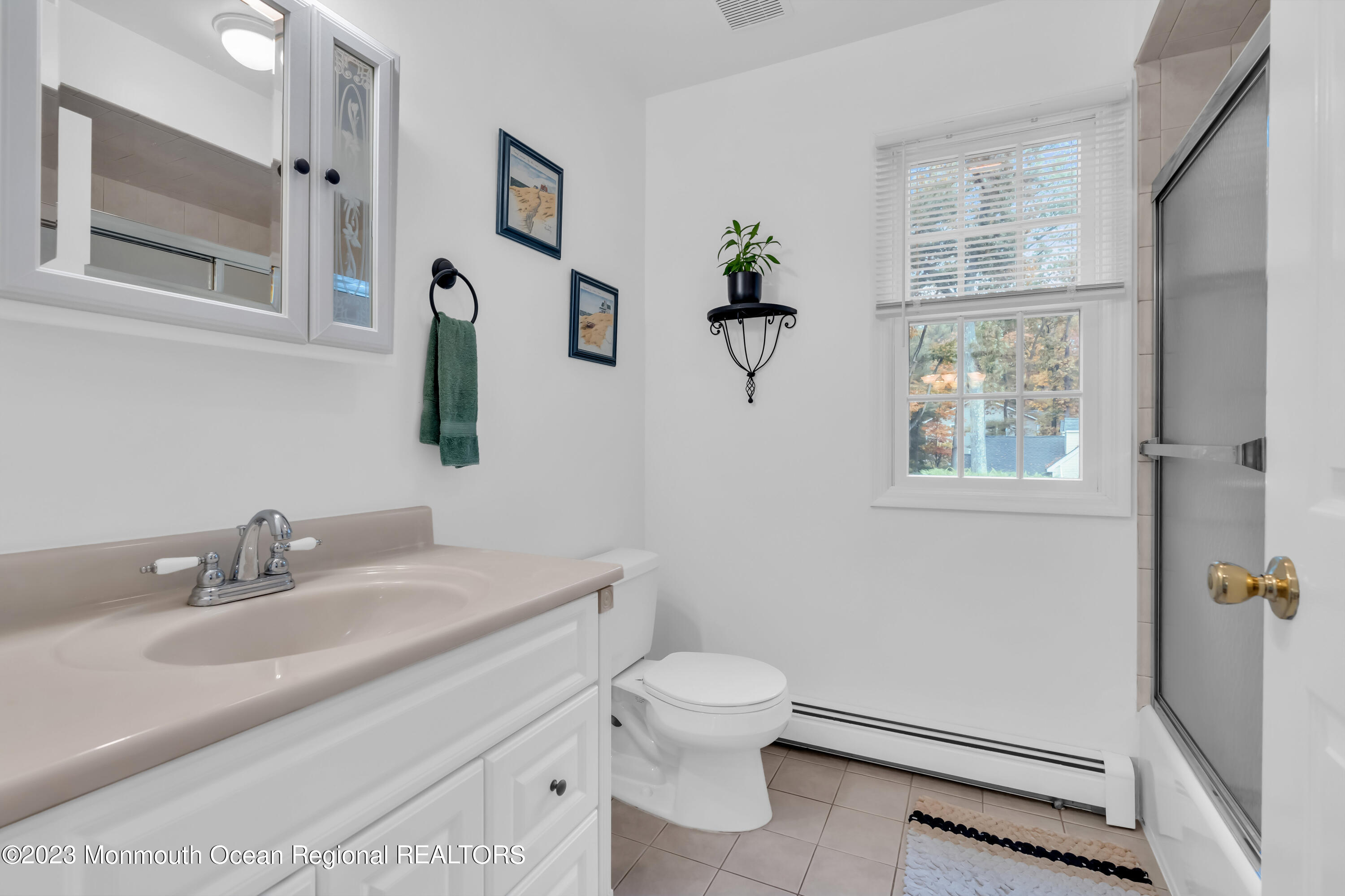 29 Muhlenbrink Road Colts Neck, NJ 07722 - Photo 32 of 36 a bathroom with a sink toilet and vanity