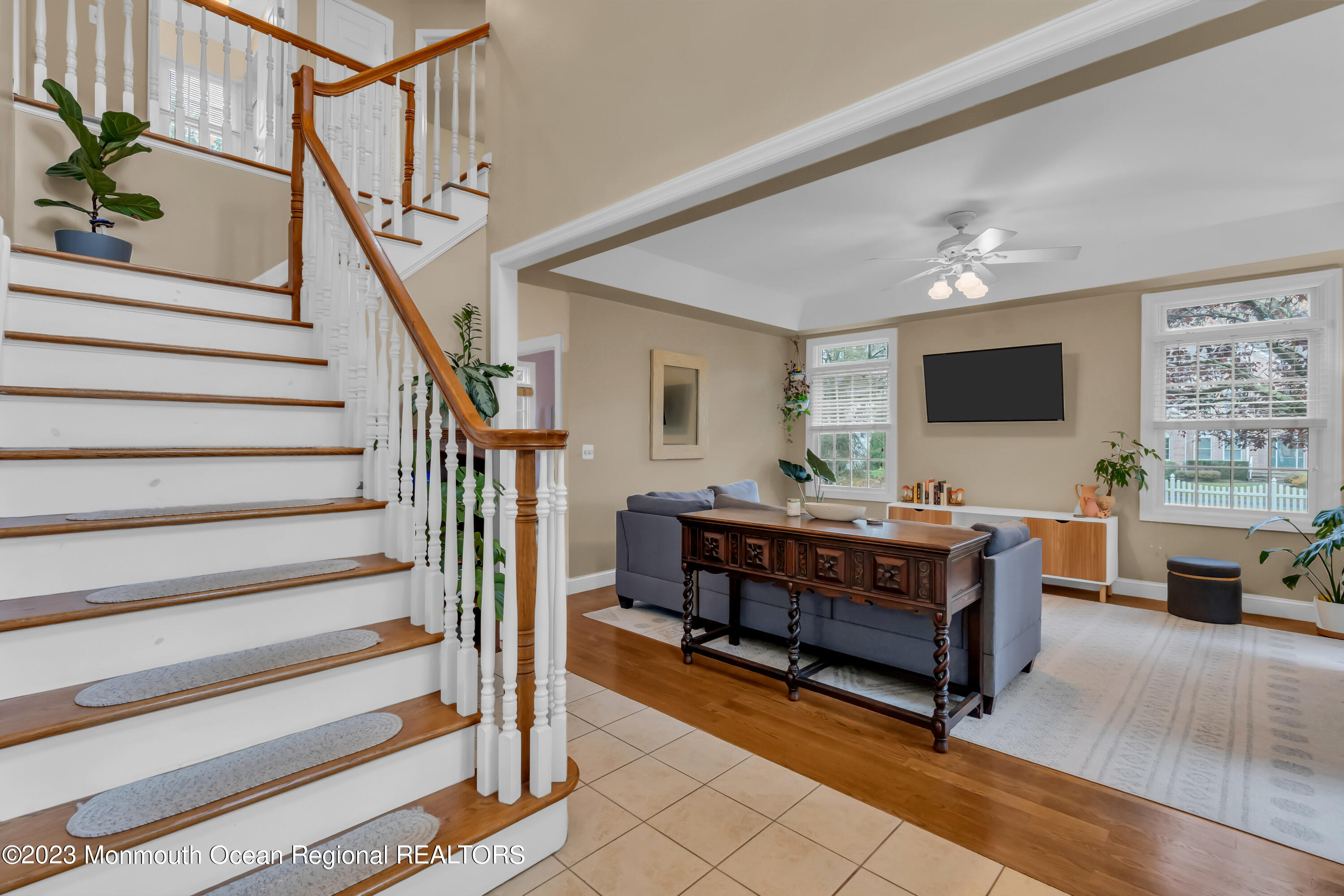 29 Muhlenbrink Road Colts Neck, NJ 07722 - Photo 7 of 36 a view of livingroom with furniture and staircase