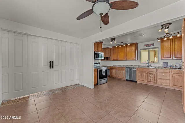 a large bathroom with a large tub and sink