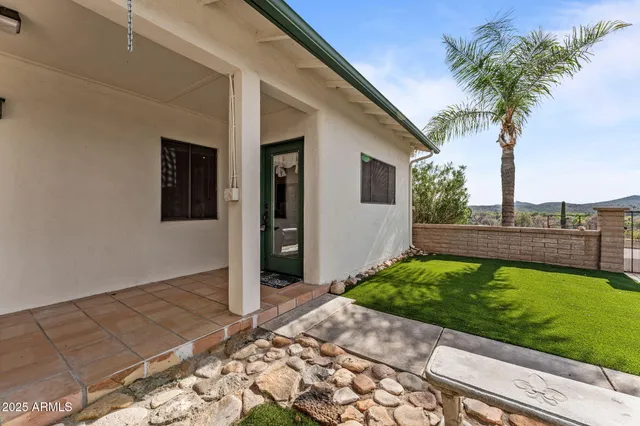 a kitchen with refrigerator and cabinets