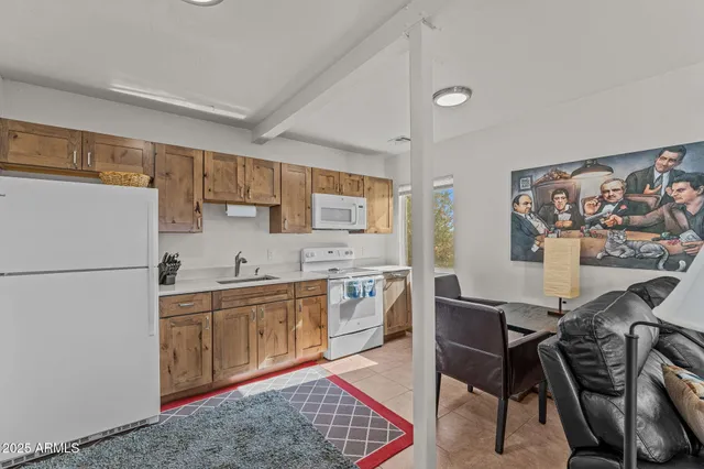 an aerial view of residential house and parking space