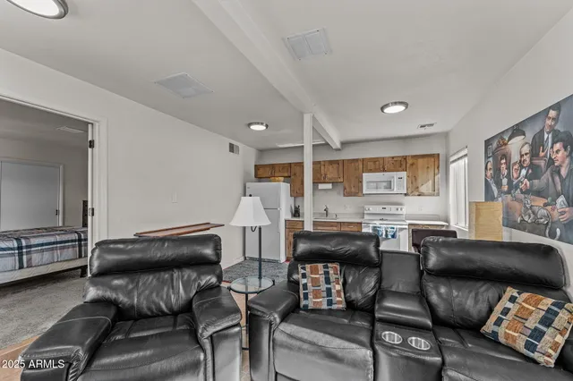 a view of a mountain range with lush green forest