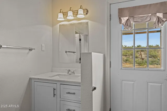 a view of mountain with a lake view