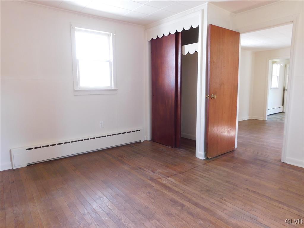 2808 Middletown Road Bethlehem, PA 18020 - Photo 11 of 40 a view of an empty room with wooden floor and a window