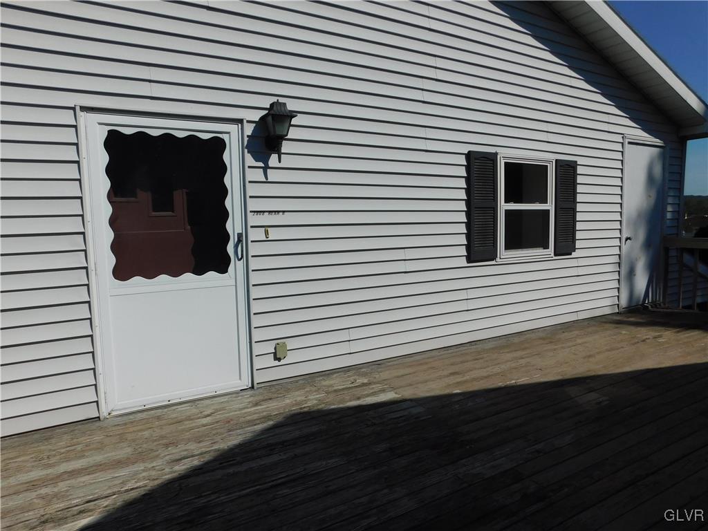 2808 Middletown Road Bethlehem, PA 18020 - Photo 28 of 40 a view of a house with a door and a yard