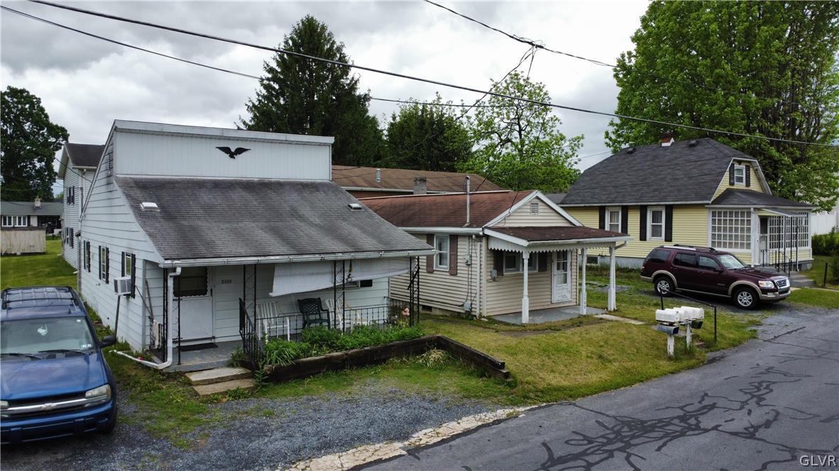 2808 Middletown Road Bethlehem, PA 18020 - Photo 4 of 40 a aerial view of a house with a yard table and chairs