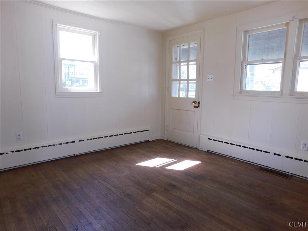 2808 Middletown Road Bethlehem, PA 18020 - Photo 9 of 40 an empty room with wooden floor and windows