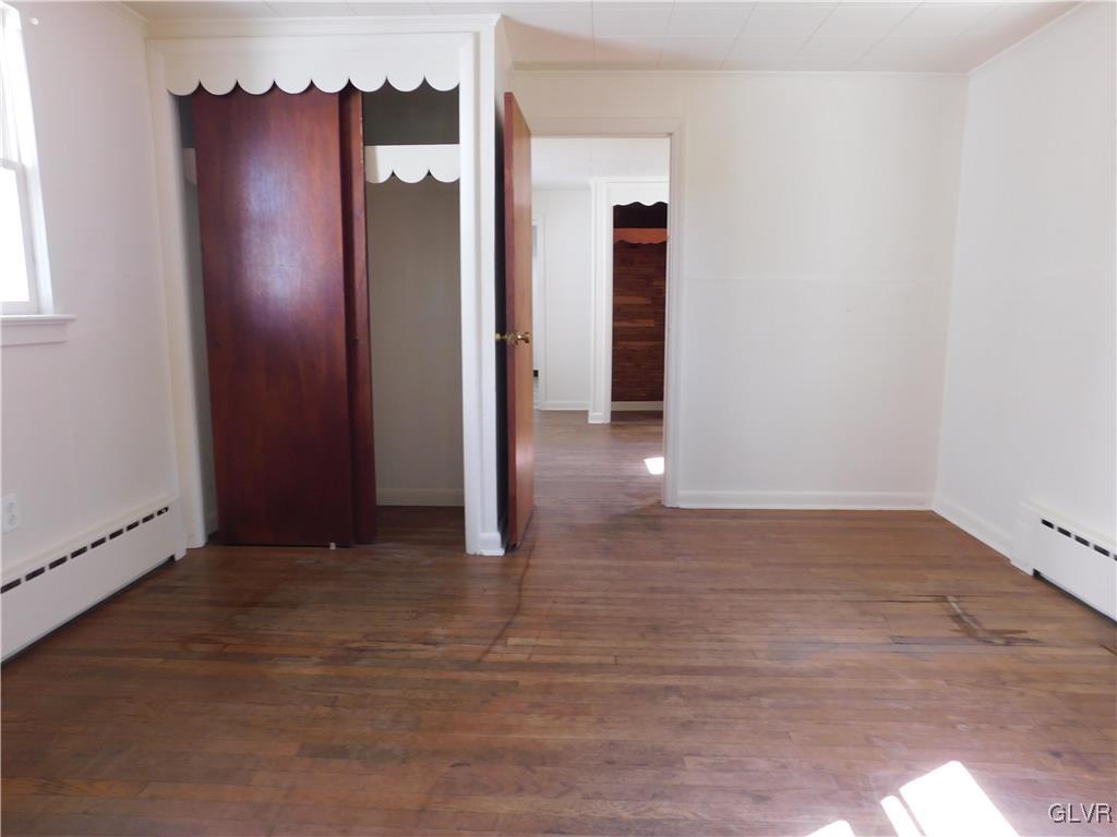 2808 Middletown Road Bethlehem, PA 18020 - Photo 10 of 40 an empty room with wooden floor and windows