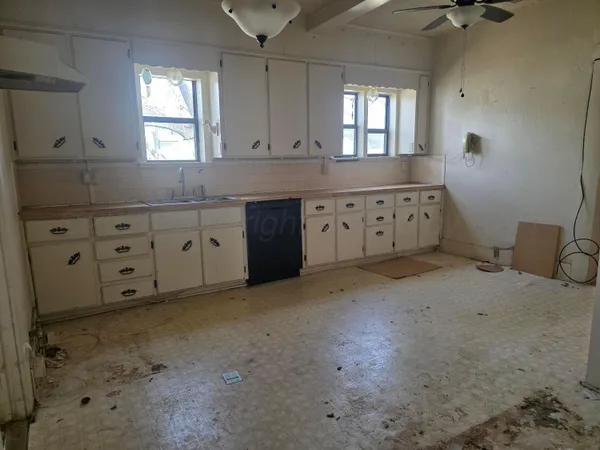 a view of a livingroom with wooden floor