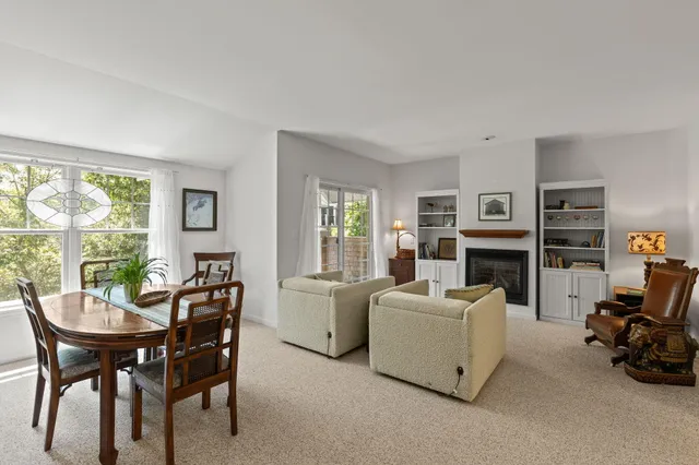 a view of a livingroom with furniture window and outside view