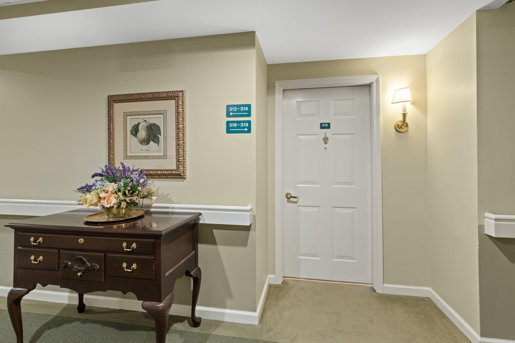 18 West Road, Unit 315 Orleans, MA 02653 - Photo 2 of 49 a room with table and chair