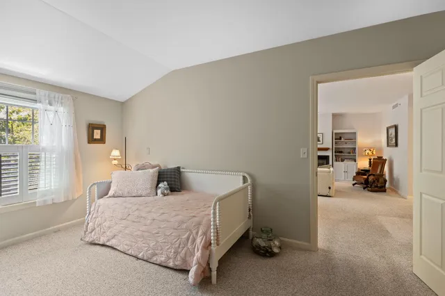 a bedroom with a bed and furniture