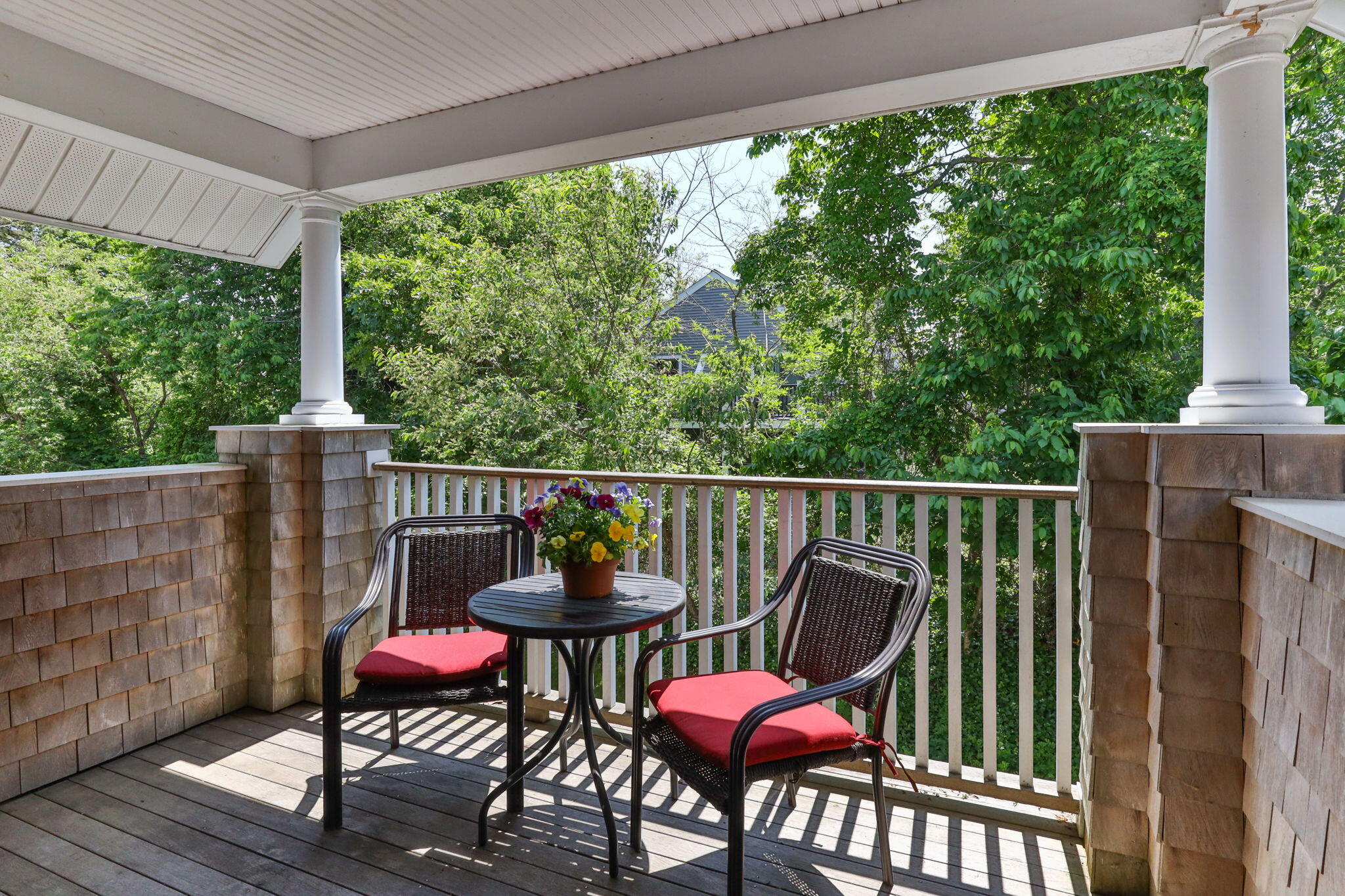 18 West Road, Unit 315 Orleans, MA 02653 - Photo 29 of 49 a view of a chairs on the deck