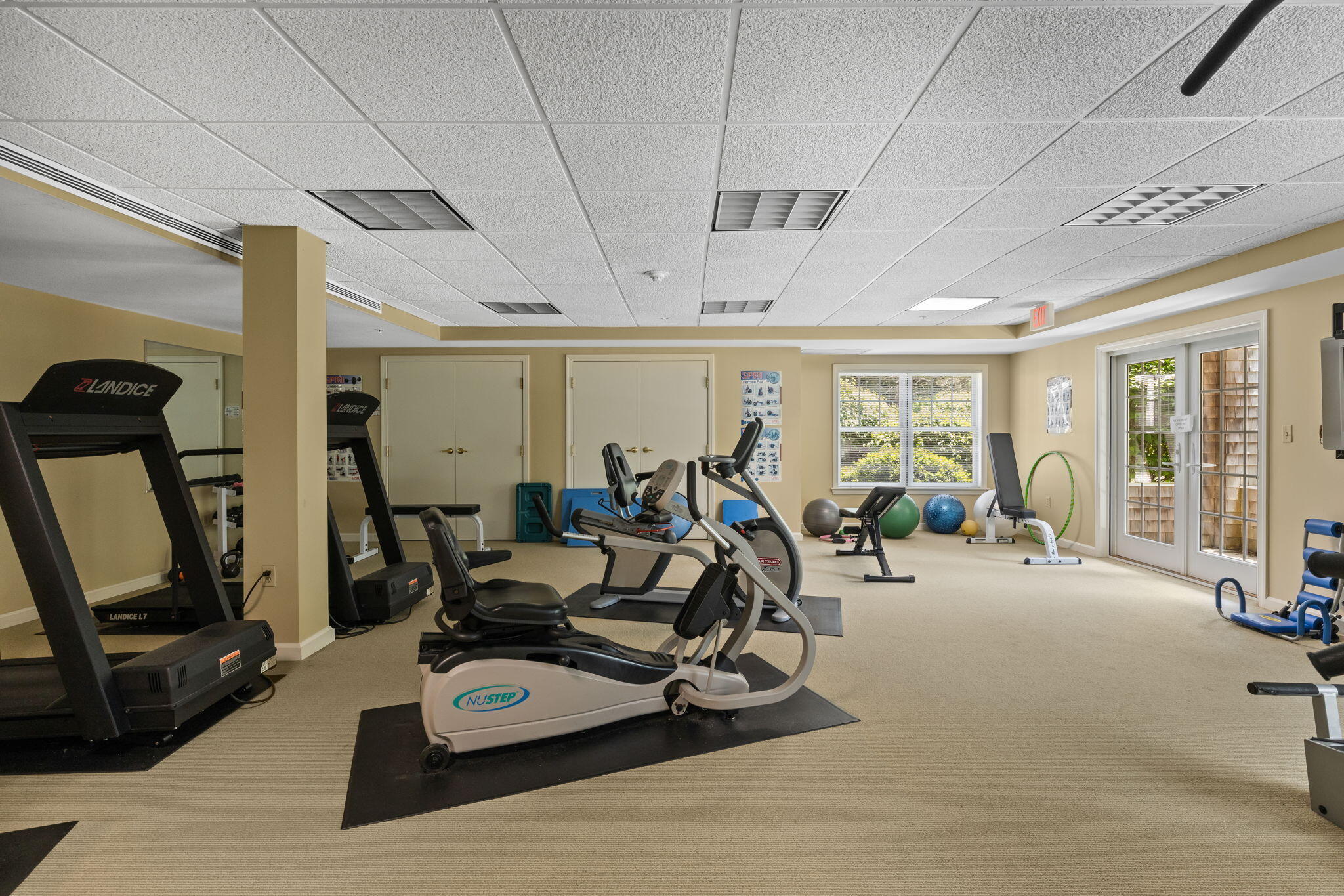 18 West Road, Unit 315 Orleans, MA 02653 - Photo 33 of 49 a view of a room with gym equipment