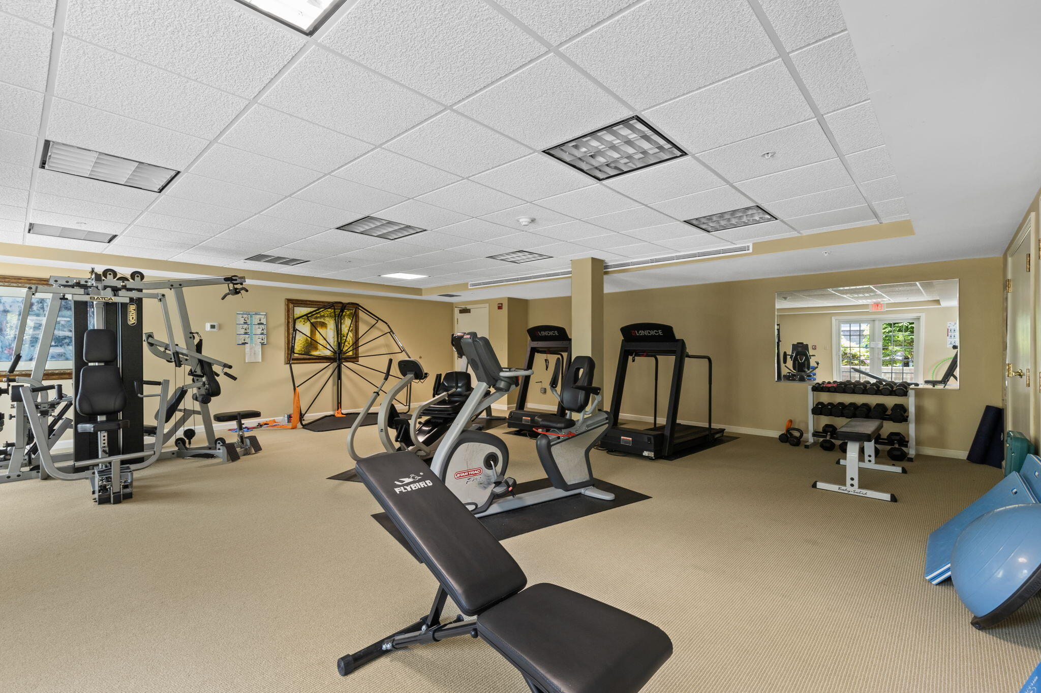 18 West Road, Unit 315 Orleans, MA 02653 - Photo 34 of 49 a view of a room with gym equipment