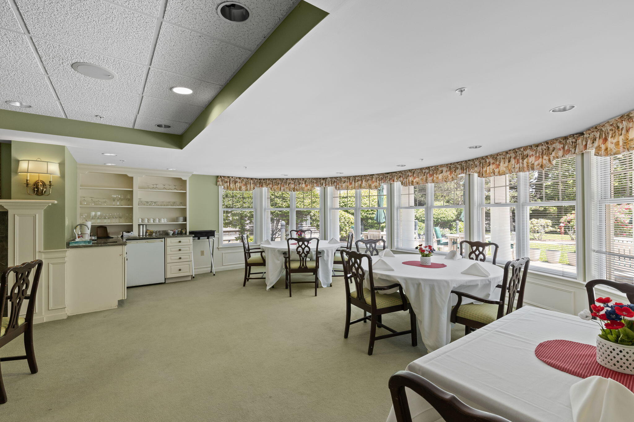 18 West Road, Unit 315 Orleans, MA 02653 - Photo 42 of 49 a room with lots of furniture and a large window