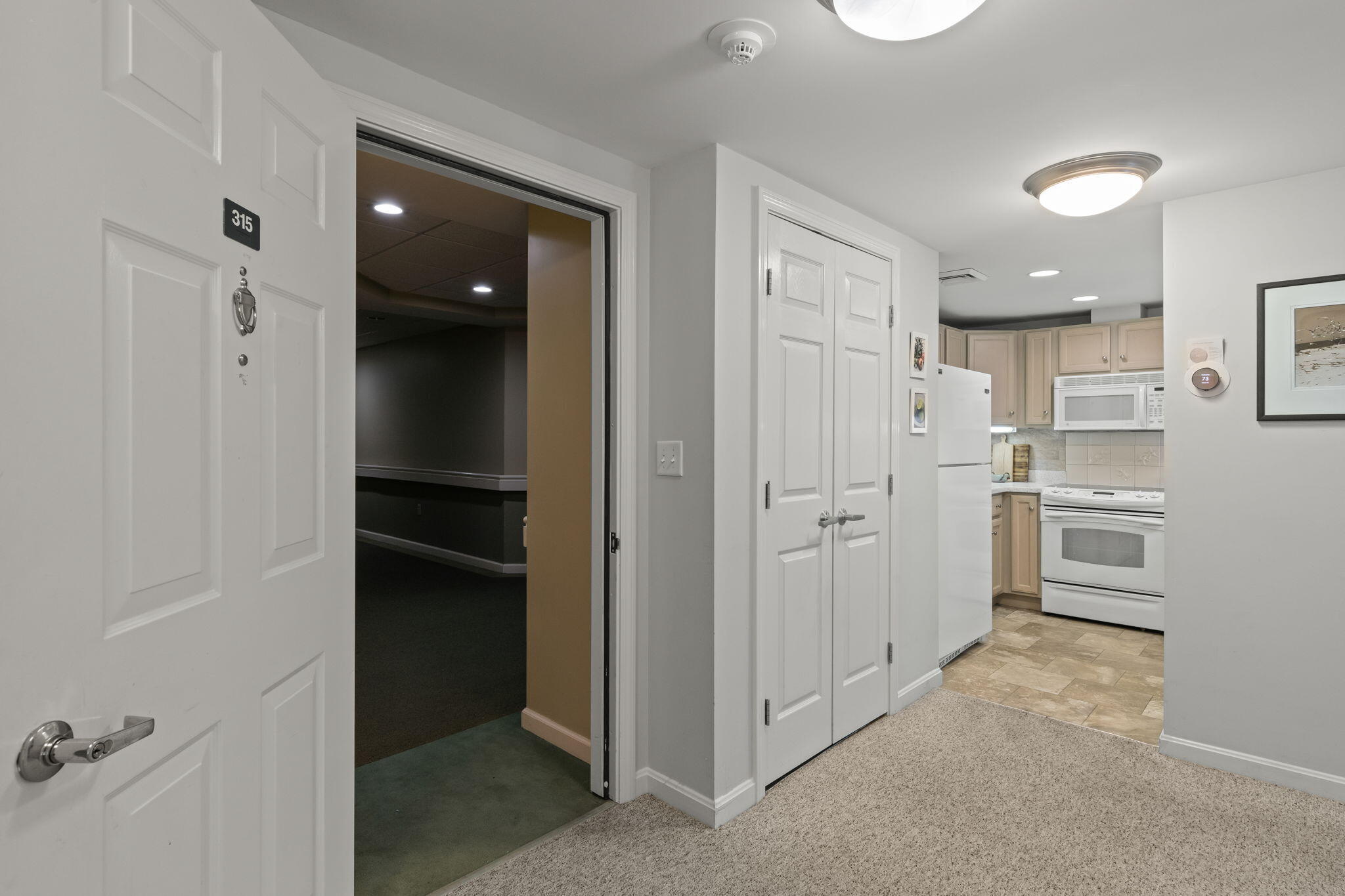 18 West Road, Unit 315 Orleans, MA 02653 - Photo 5 of 49 wooden floor in an empty room and an empty room