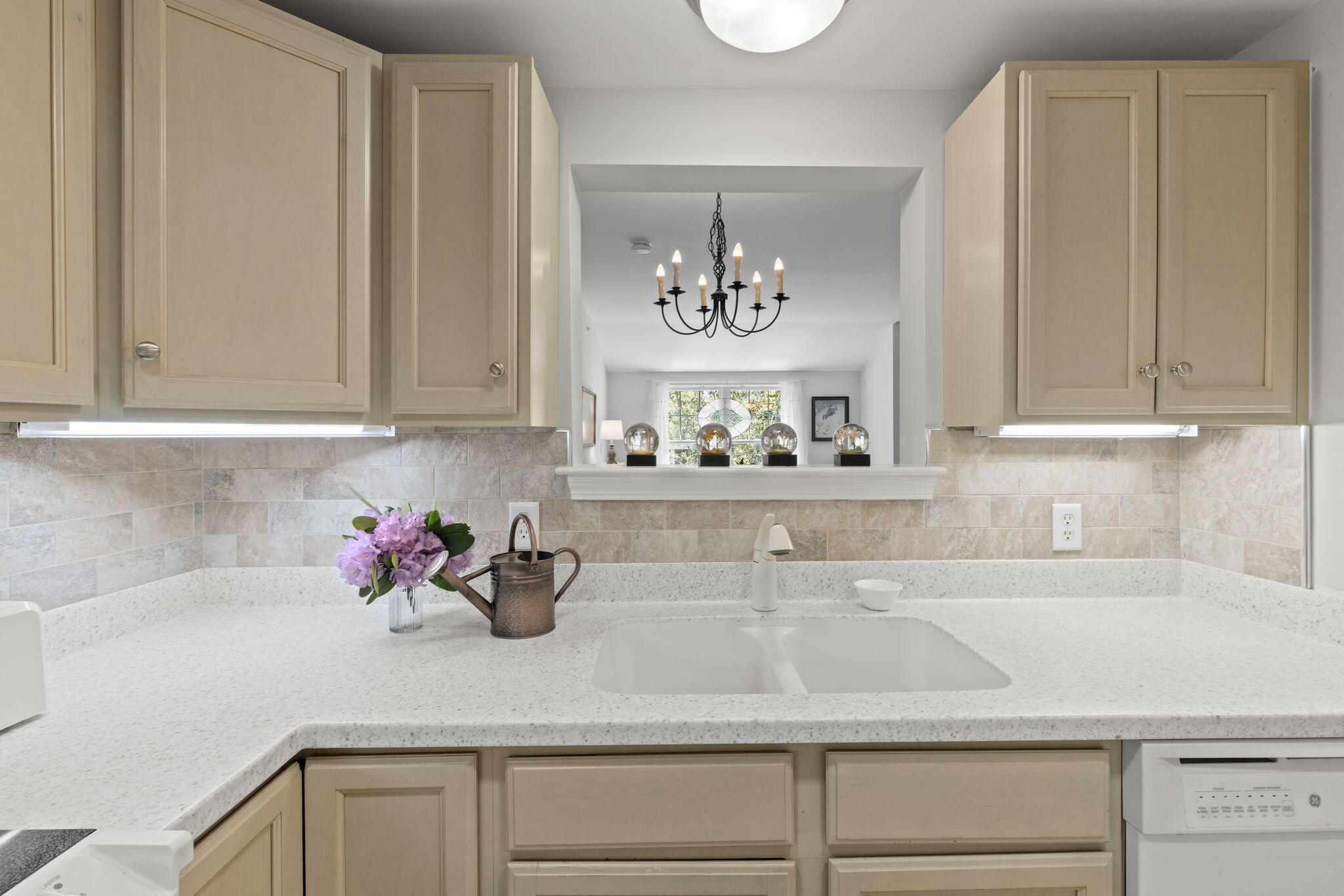 18 West Road, Unit 315 Orleans, MA 02653 - Photo 10 of 49 a kitchen with stainless steel appliances granite countertop a sink and cabinets