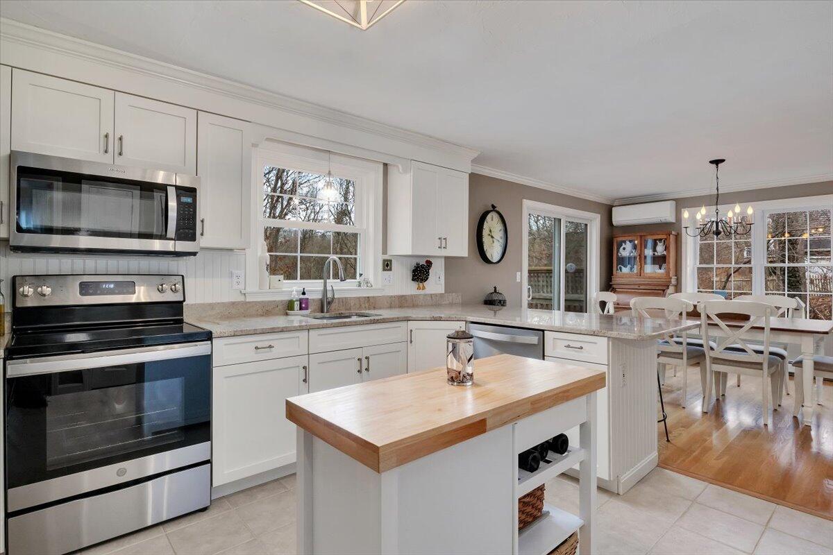 25 Christopher Hollow Road Sandwich, MA 02563 - Photo 15 of 47 a kitchen with a sink stove and microwave