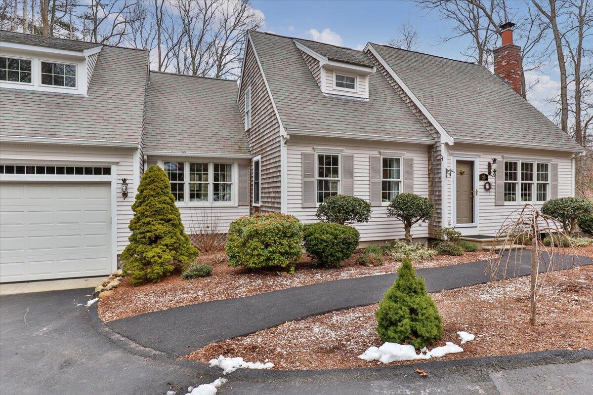 25 Christopher Hollow Road Sandwich, MA 02563 - Photo 4 of 47 a front view of a house with garden