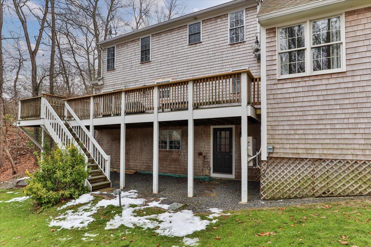 25 Christopher Hollow Road Sandwich, MA 02563 - Photo 41 of 47 a front view of a house with a yard