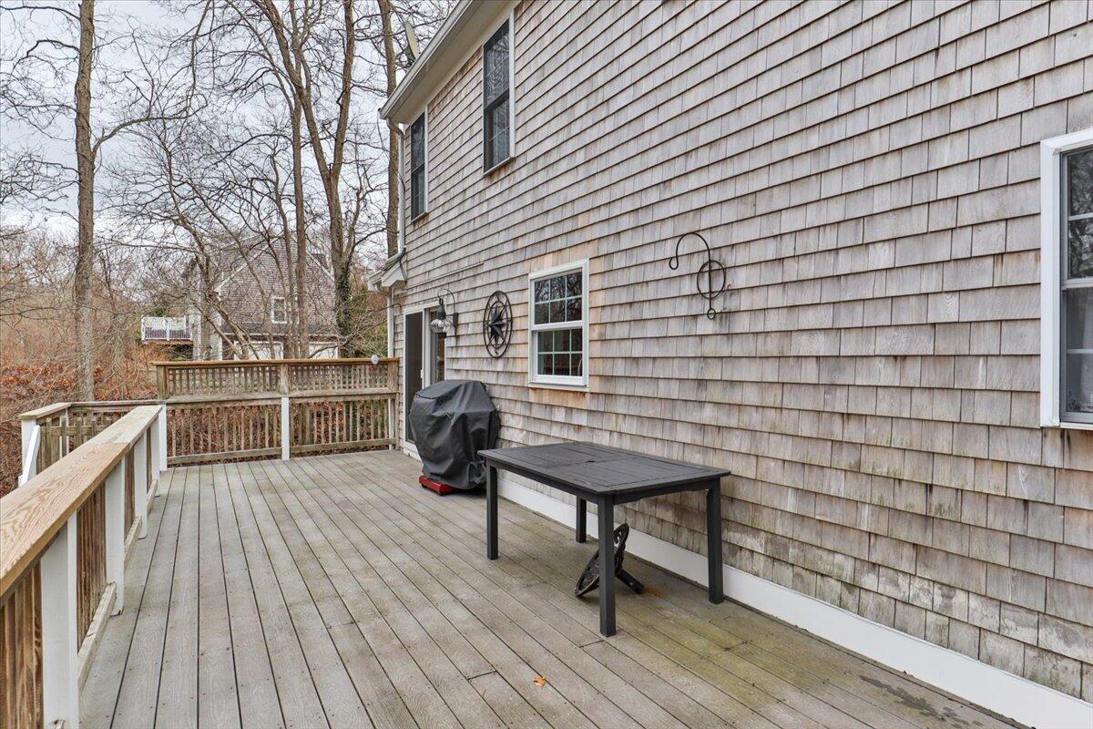 25 Christopher Hollow Road Sandwich, MA 02563 - Photo 44 of 47 a view of a chairs and table on the wooden floor