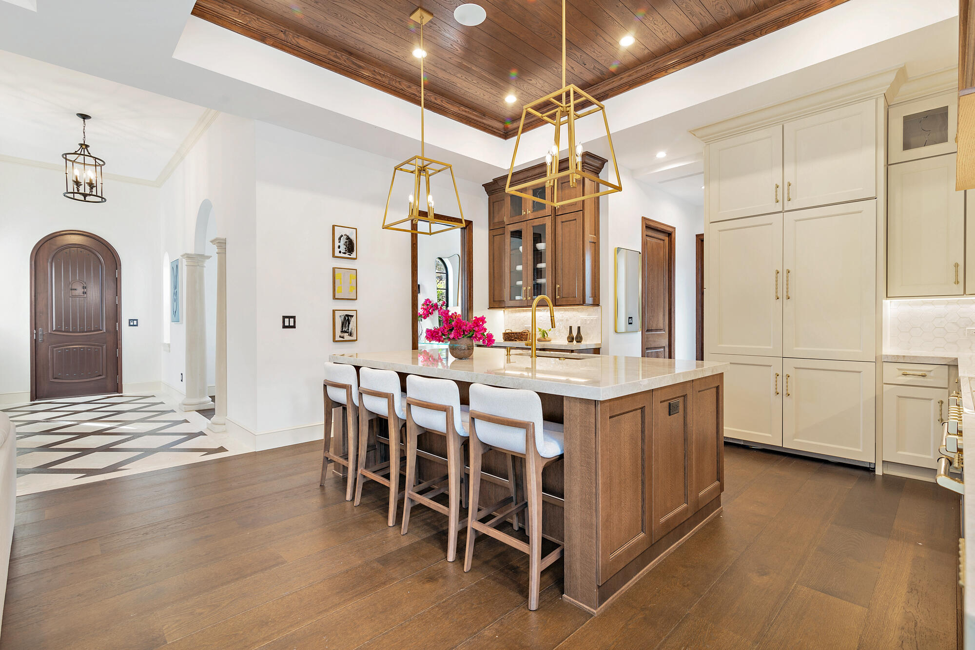 265 Marlborough Road West Palm Beach, FL 33405 - Photo 21 of 77 a large white kitchen with lots of counter space and chandelier