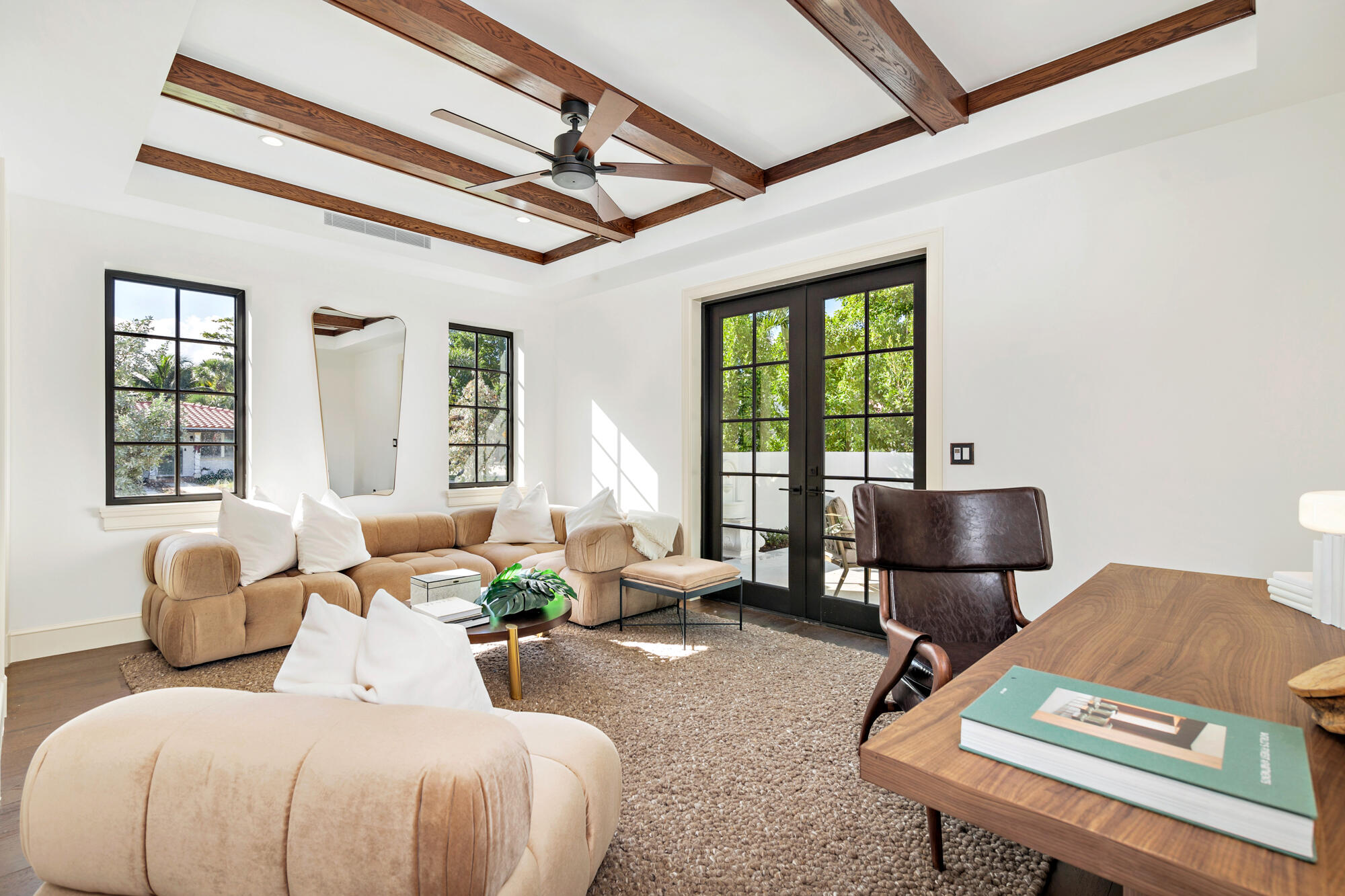 265 Marlborough Road West Palm Beach, FL 33405 - Photo 29 of 77 a bedroom with a bed a large window couch and a table