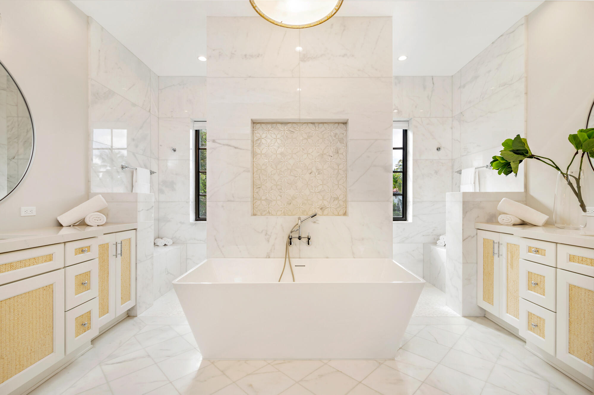 265 Marlborough Road West Palm Beach, FL 33405 - Photo 40 of 77 a bathroom with a double vanity sink a mirror and a bathtub