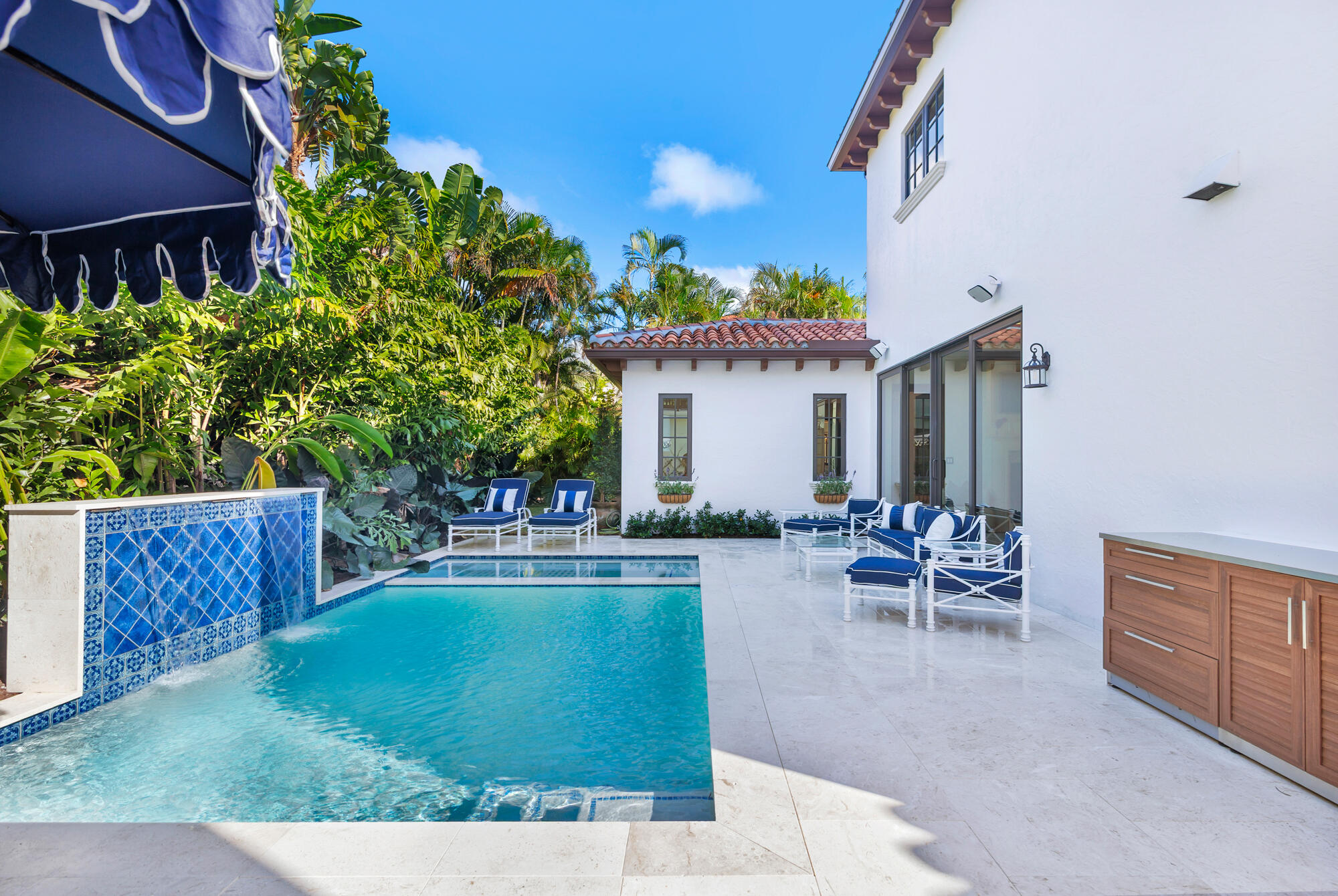 265 Marlborough Road West Palm Beach, FL 33405 - Photo 63 of 77 a view of a house with backyard porch and sitting area